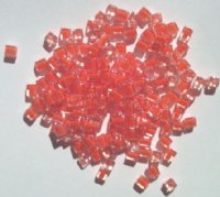 10 grams of 4x4mm Colorlined Opaque Orange Miyuki Cubes